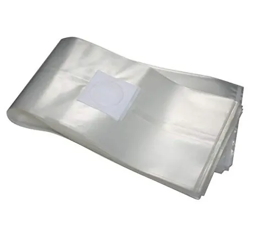A stack of clear plastic packaging bags with a white square patch on top.