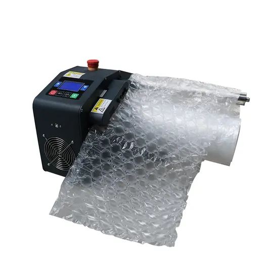Industrial machine producing a continuous sheet of bubble wrap from a plastic film roll