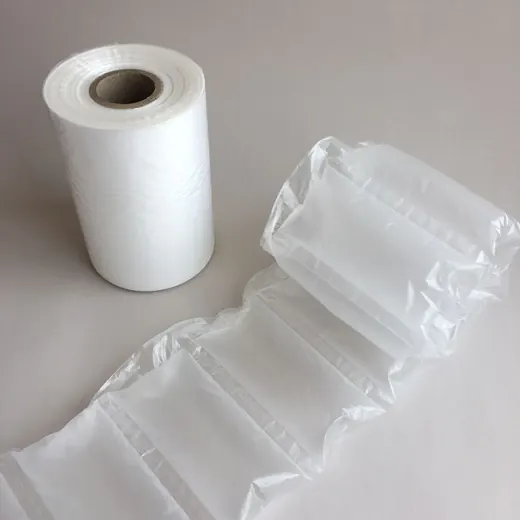 Roll of white air cushion film beside an inflated air pillow packaging material on a plain light background
