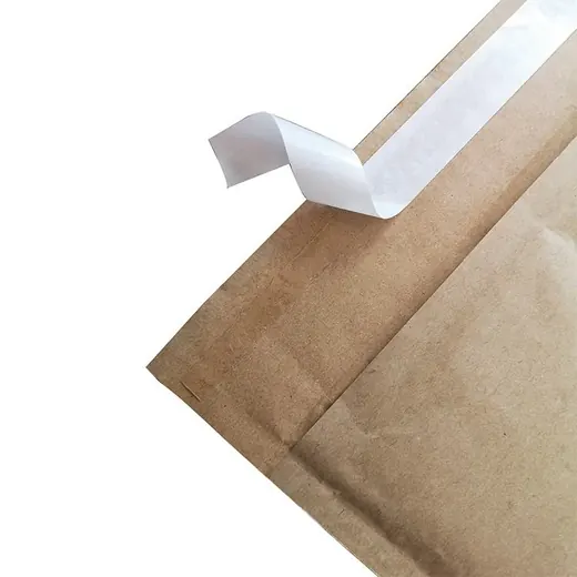 Kraft paper padded mailer envelope with white peel-and-seal adhesive strip partially peeled, on a white background