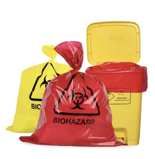 Red and yellow biohazard bags and a yellow pedal bin with a red liner