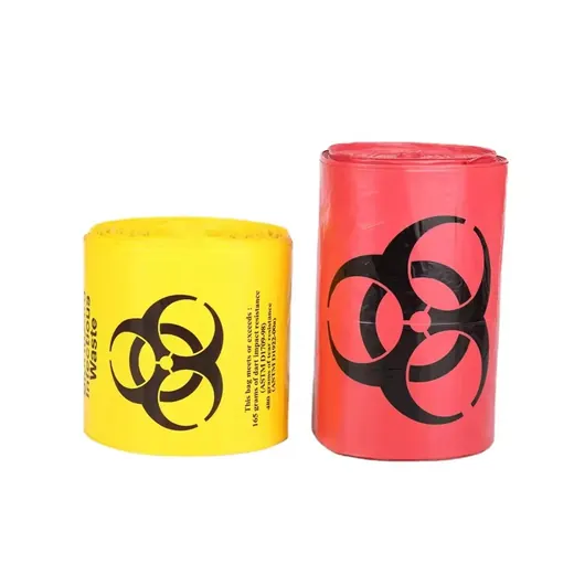 Yellow and red rolls of biohazard waste bags with printed warning symbols