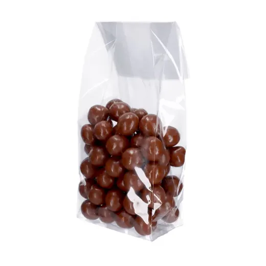 Clear plastic bag containing brown, round, candy-like spheres.