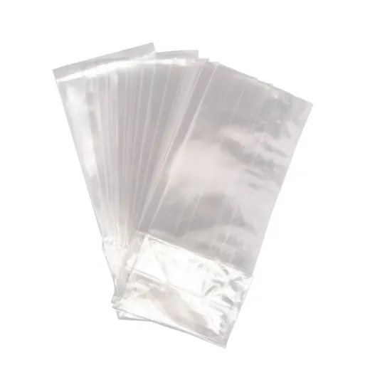 Stack of clear plastic packaging bags fanned out on a white background