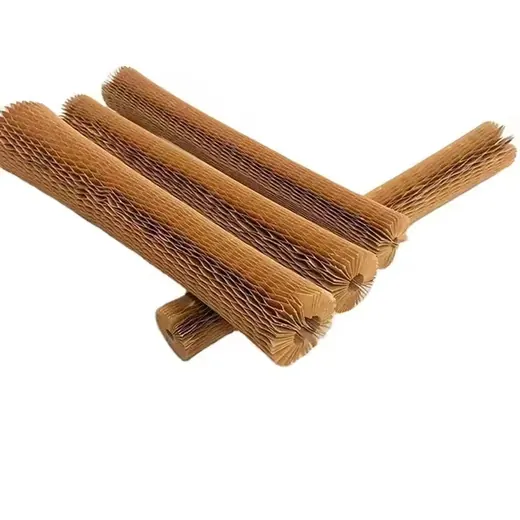 Brown honeycomb evaporative cooling pad rolls scattered diagonally on a plain white background