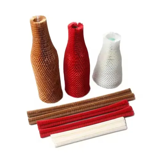 Honeycomb paper bottle sleeves in brown, red and white with flat honeycomb paper tubes on a white background