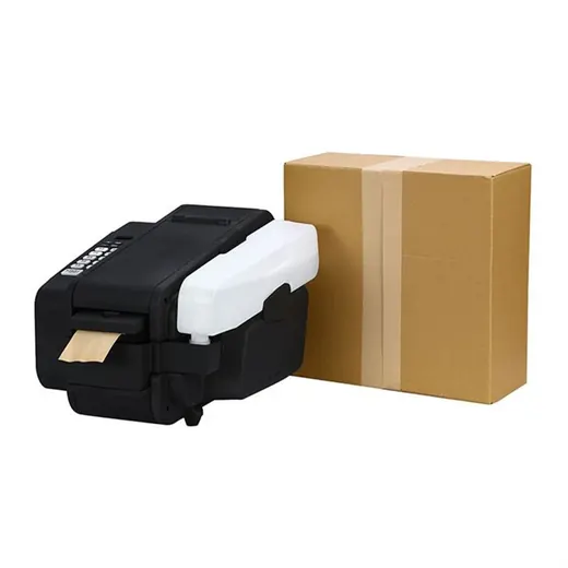 Industrial label printer applying a label to a cardboard box on a white background