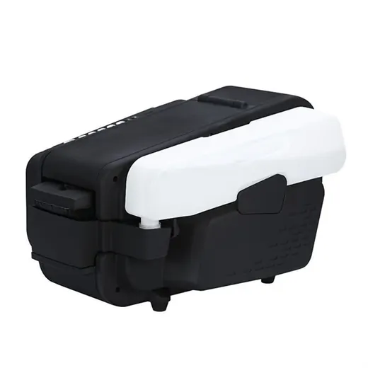 A compact black and white industrial machine with a top cover and side connectors on a white background.