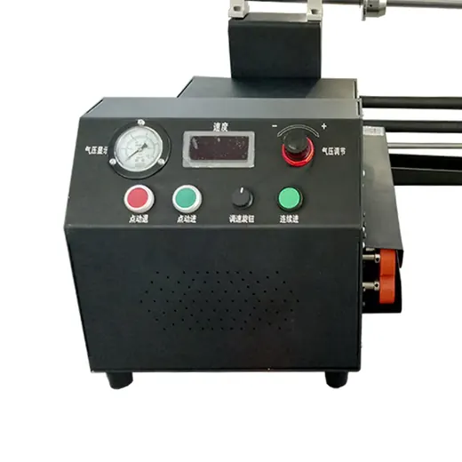 Close-up of a black industrial machine control panel featuring a pressure gauge, digital display, and push buttons.