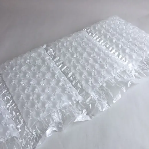 Translucent air cushion bubble wrap sheet laid diagonally on a plain white surface
