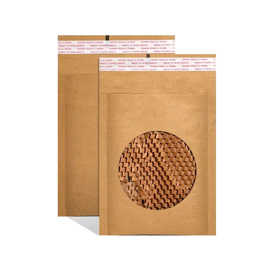 Two brown paper envelopes with a circular window revealing honeycomb packing material inside.