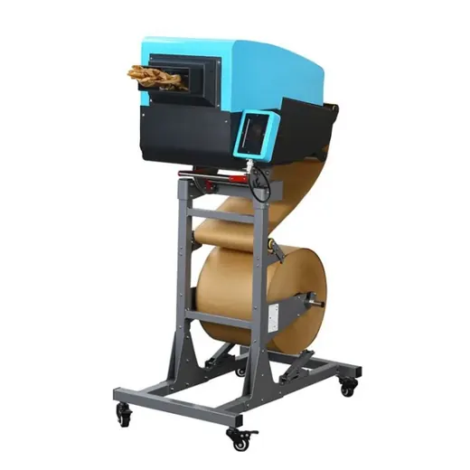 Blue and black industrial packaging machine with cardboard reel on stand