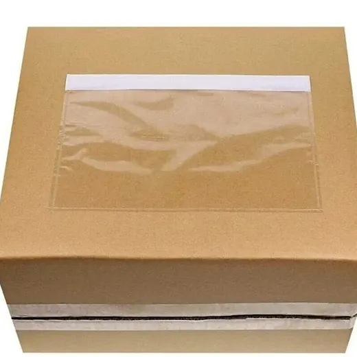 Brown cardboard box with a clear plastic document pouch attached to the top