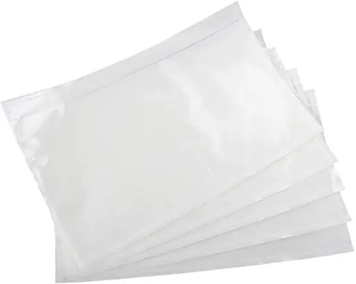 Fan of clear plastic pouches with visible seams arranged diagonally on a plain white background