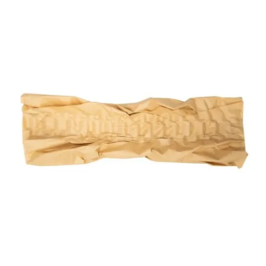 Strip of crumpled brown kraft paper packaging material on a plain white background