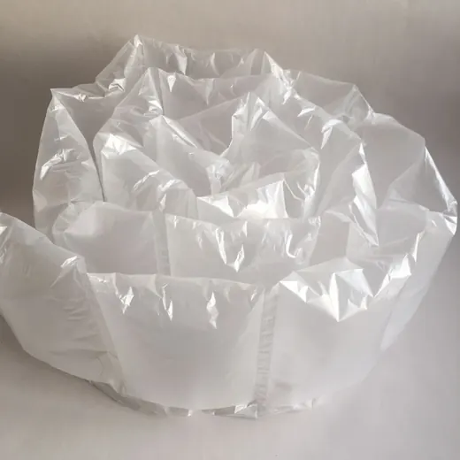 Coiled translucent white inflatable air cushion packaging wrap on a plain light background