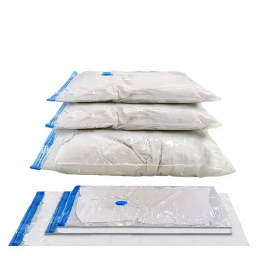 Three stacked vacuum storage bags with blue compression valves above one flat sealed bag on a white background