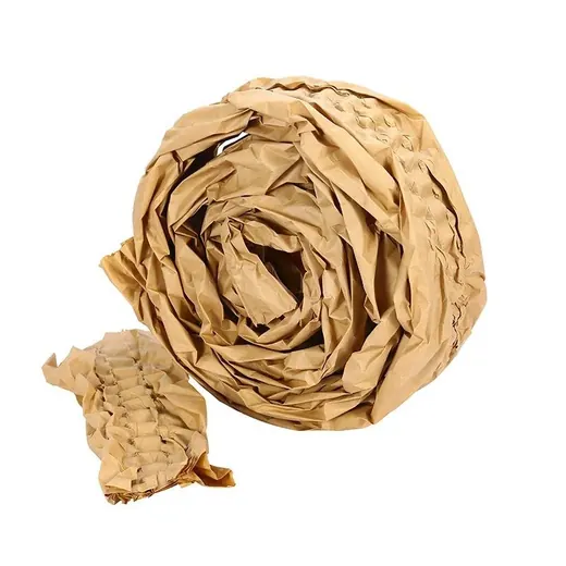 Roll of crumpled brown kraft paper cushioning wrap with a loose sheet in front on a white background