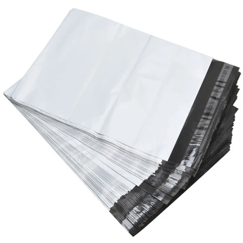 Stack of clear plastic poly bags with black adhesive strips