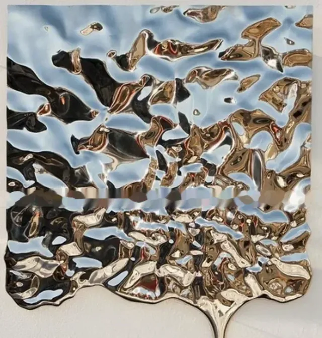 Anish Kapoor's Water Ripple Mirror Wall Sculpture at the Exhibition Center of Art manufactured in stainless steel