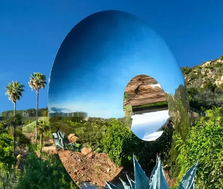 Mirror-polished disc sculpture