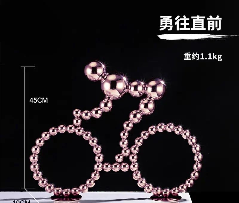 Rose gold bicycle sculpture made of metal spheres with dimension lines and Chinese text overlays.