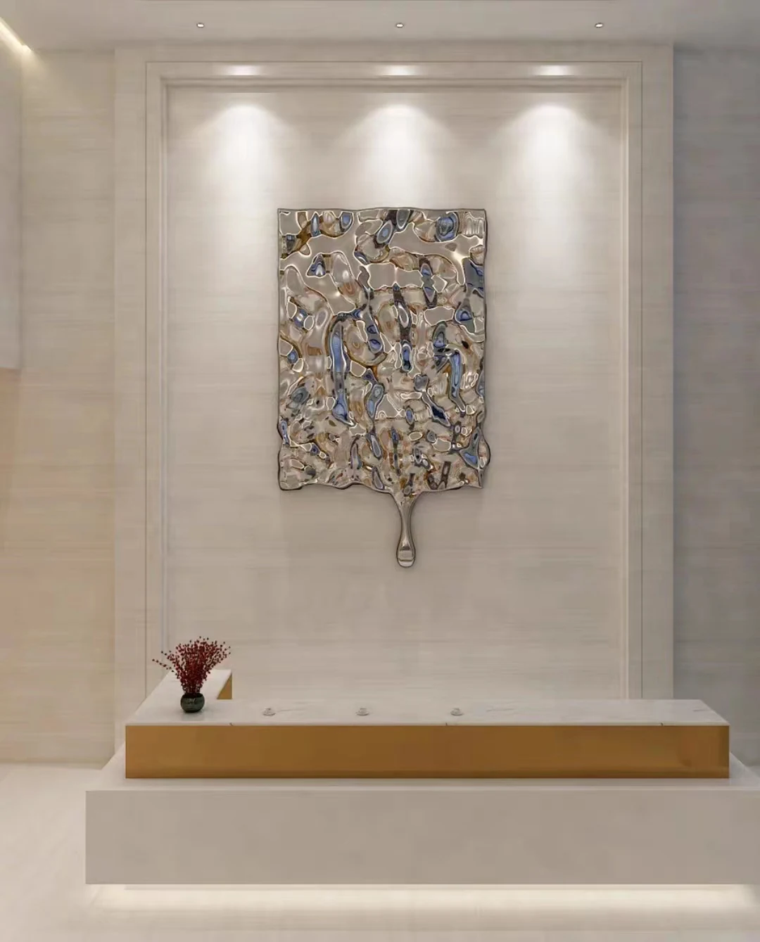 Wavy water drop stainless steel wall panel installed across a lobby wall