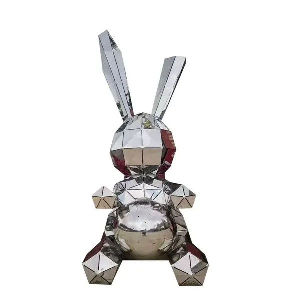 Faceted mirror-polished stainless steel rabbit sculpture with geometric panels, isolated on white background