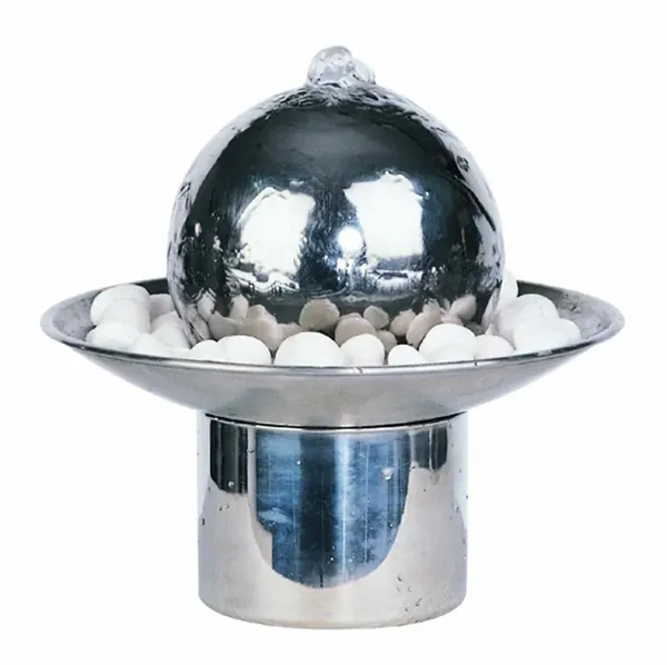 Polished stainless steel sphere water fountain with a round basin filled with white pebbles