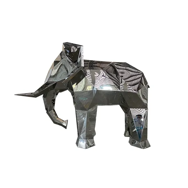 Polished stainless steel geometric elephant sculpture with faceted reflective panels on a white background