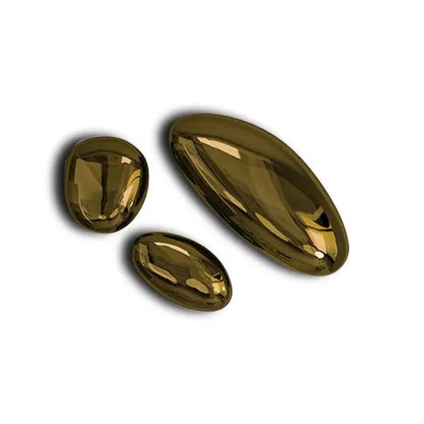 Three polished stone shaped wall pieces in graduated sizes