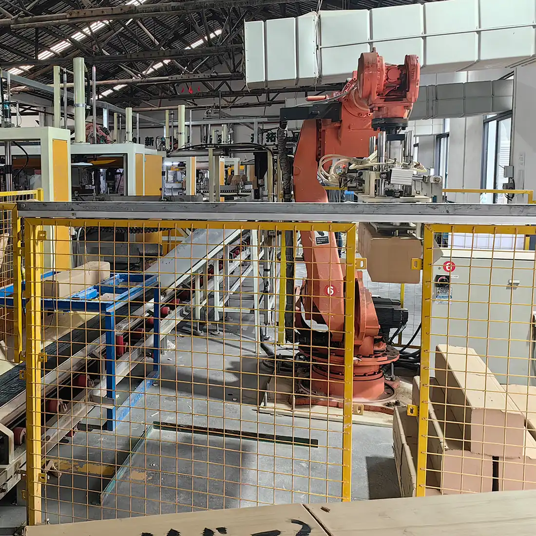 Automated pressing and handling cell on the Baolifeng insulator production line