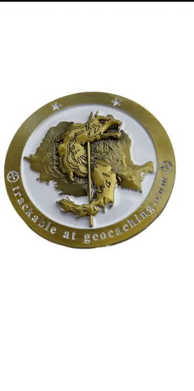 Antique Bronze Relief Challenge Coin showing an antique bronze coin with a raised relief centre
