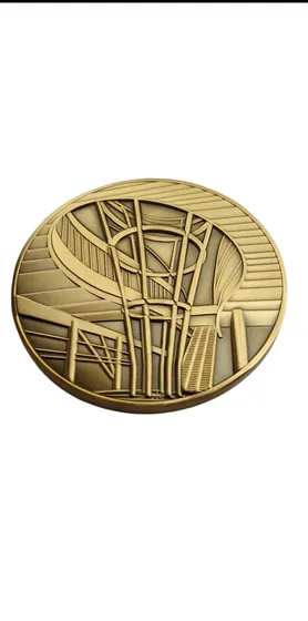 Antique Gold Relief Medal showing an antique gold medal struck with an architectural relief