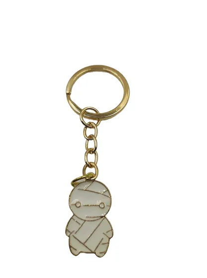 Antique plated metal figure keychain on a split ring