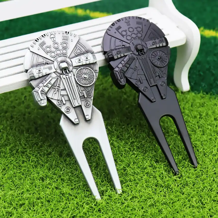 Spaceship divot tool with ball marker in place