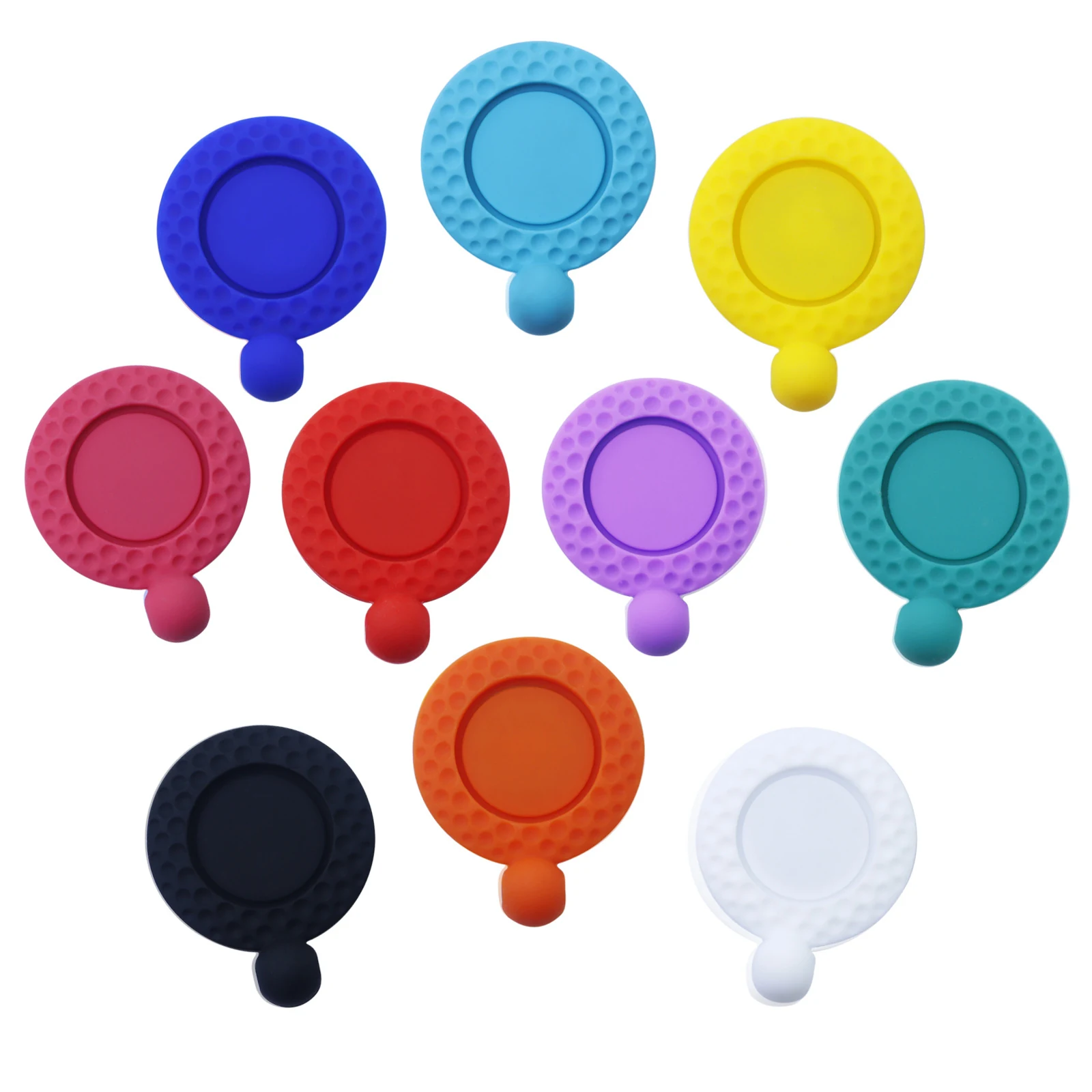 Silicone golf towel clip with moulded ball marker recess