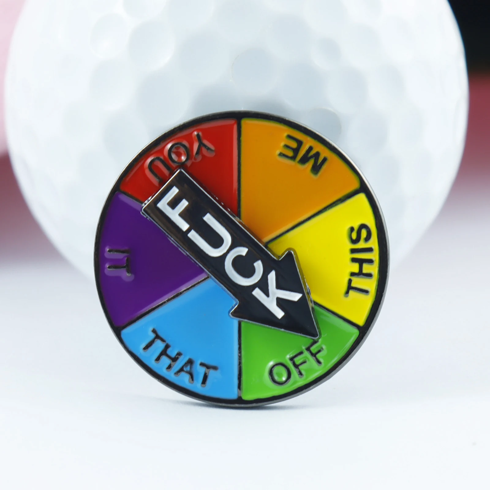 Soft enamel rotating golf ball marker with alignment face