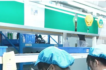 Assembly line with fixtures and part bins staged at each station