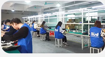 Line staff in Bisd uniform assembling handheld units