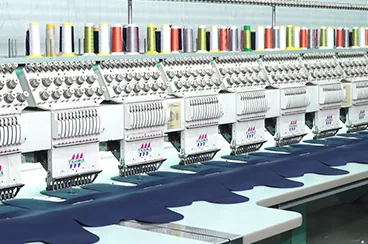Embroidery machines used for branded fabric parts