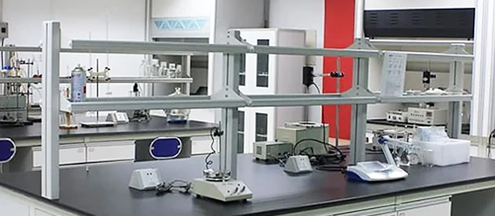 Analytical glassware on the Blissam quality control laboratory bench