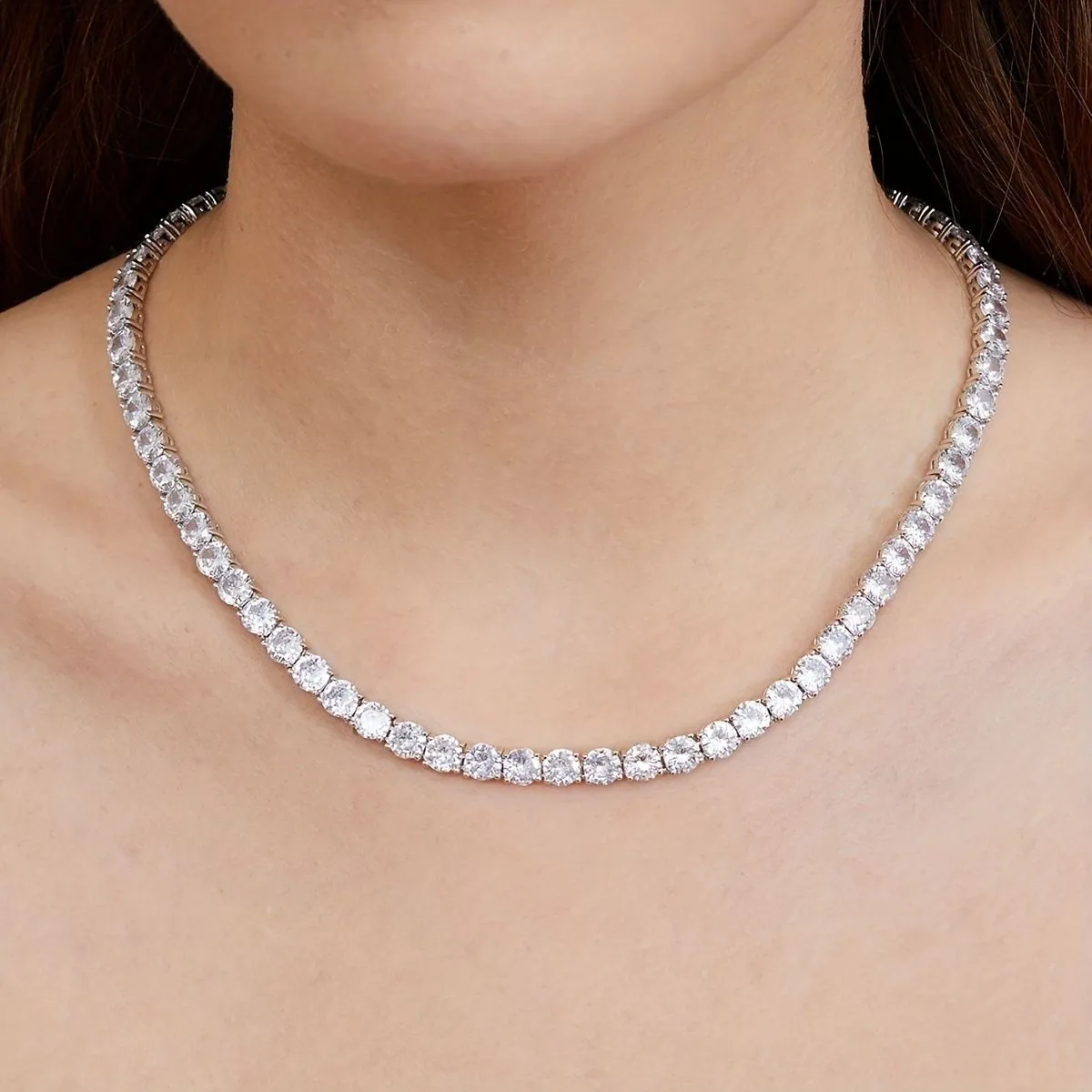 Model wearing a cubic zirconia tennis necklace made by BlueOne Jewelry