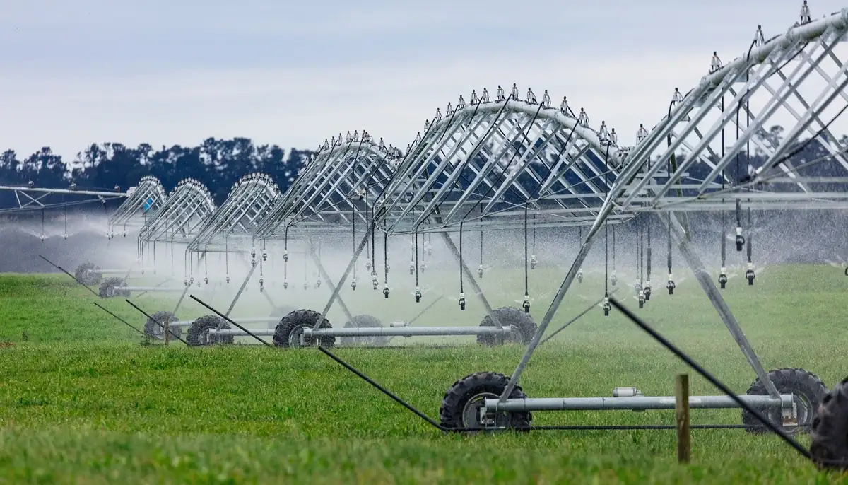 Centre pivot irrigation machines running across a field