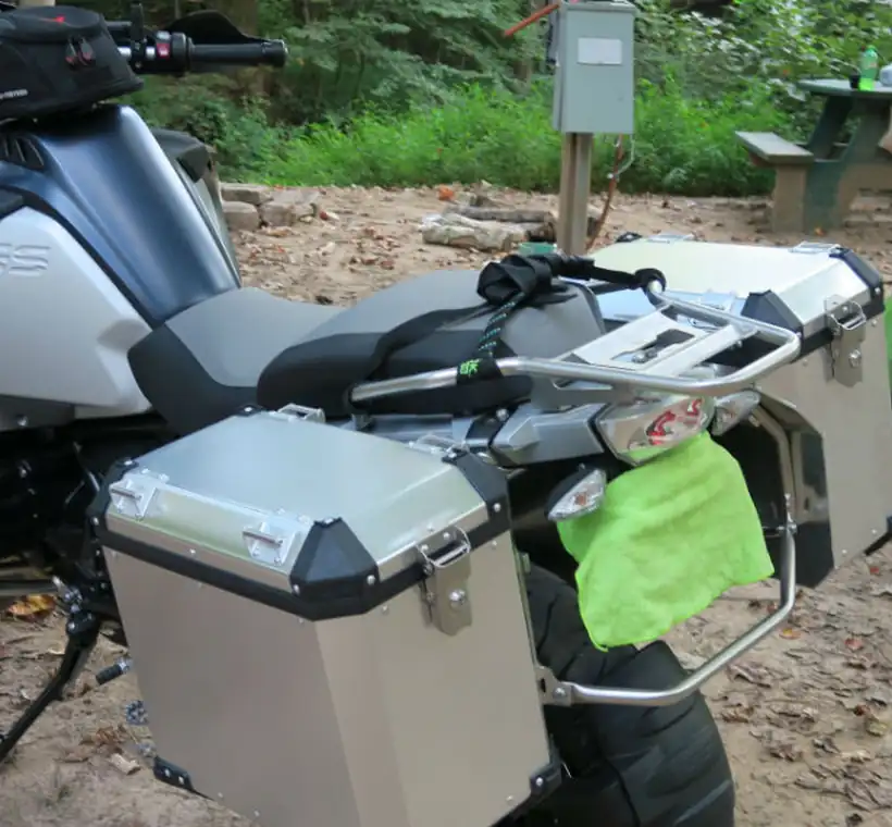 Adventure motorcycle fitted with Brooks aluminum panniers