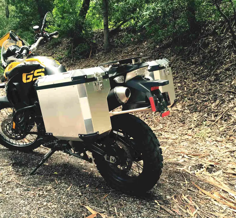 Adventure motorcycle fitted with Brooks aluminum panniers