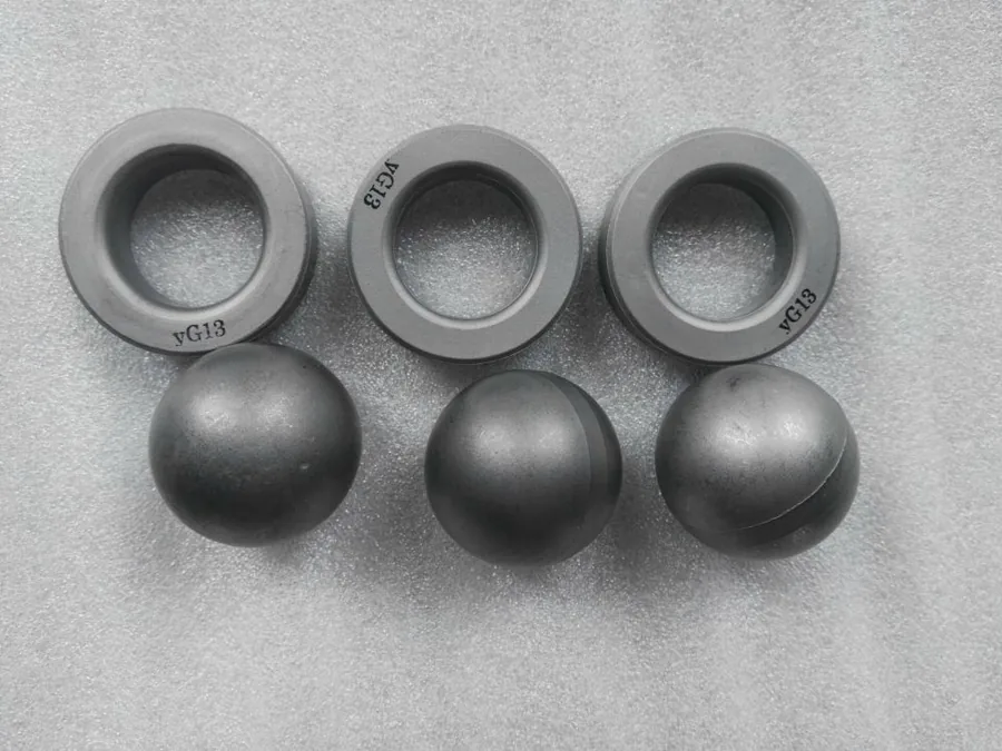 Tungsten carbide balls and seats forming API V11 series valve pairs