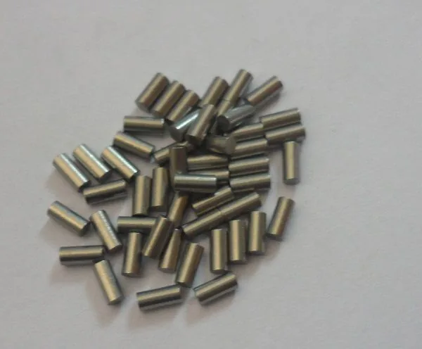 Carbide pin blanks after grinding ready for pressing into holders