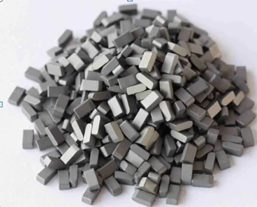 Carbide saw tips sorted by size before packing