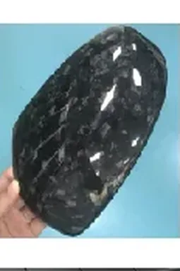 Forged carbon fiber part with a marbled surface pattern